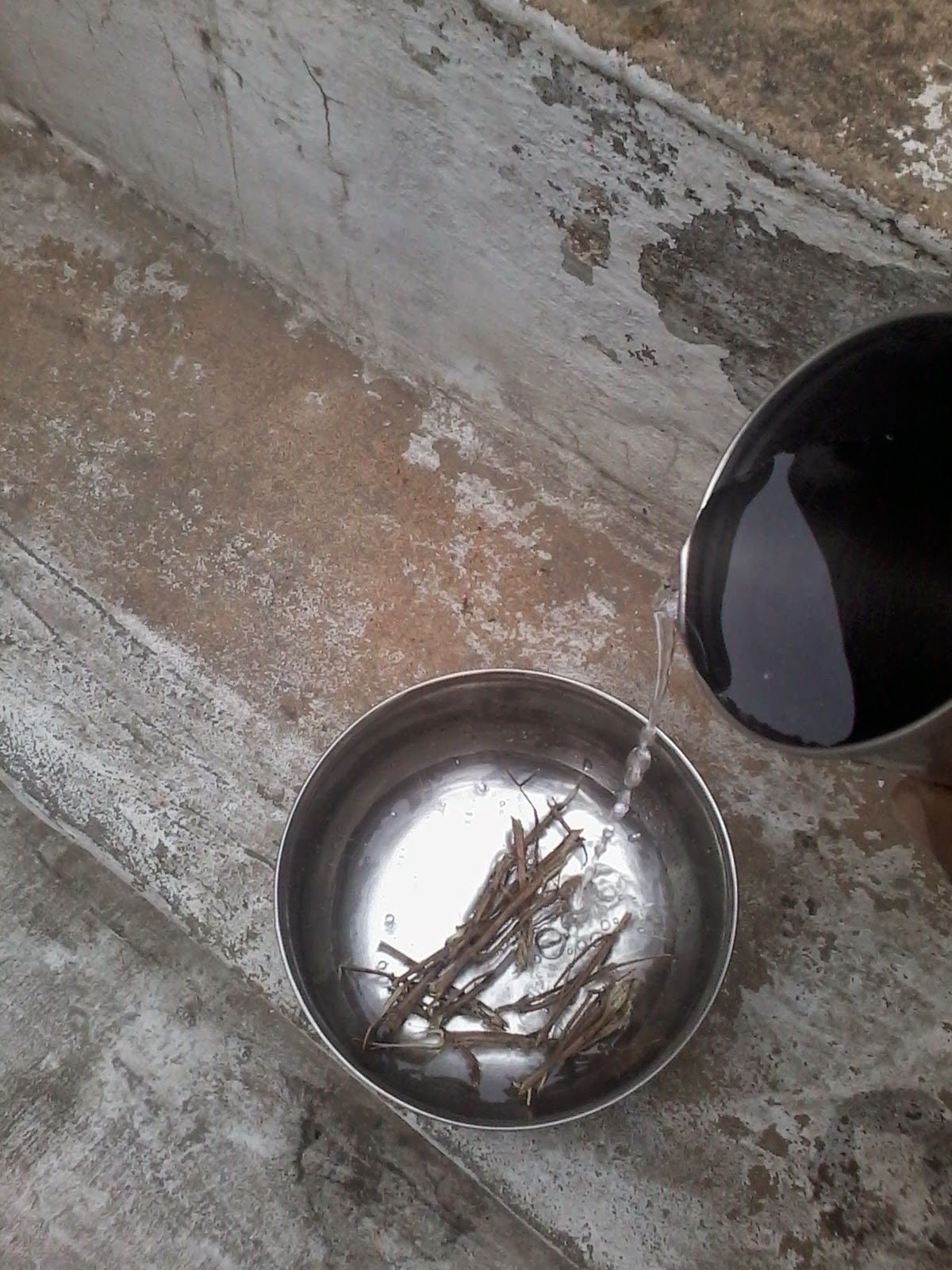 Take few pieces of dry Tulsi  in bowl and add water