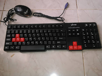  Keyboard komputer dan telepon genggam