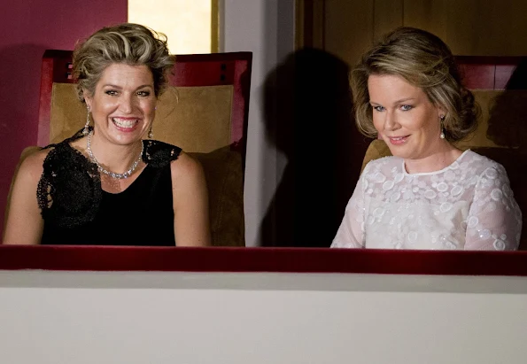 Queen Mathilde and Queen Maxima attend the finals of the Queen Elisabeth piano competition in Palace of Fine Arts. Queen Mathilde and Queen Maxima wore Natan Dress