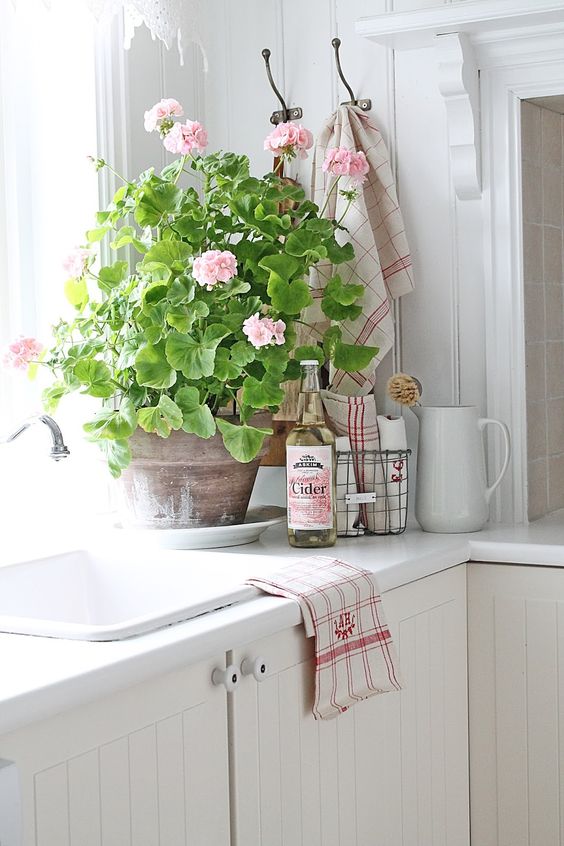 Spring pink farmhouse kitchen with flowers