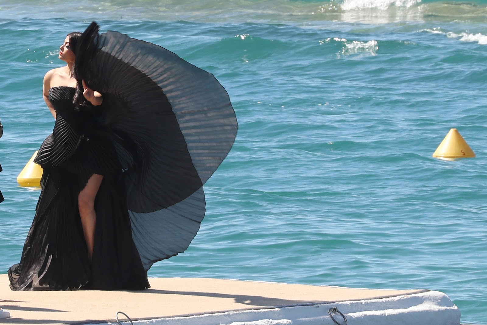 Aishwarya Rai Looks Irresistibly Sexy in Black Dress During a Photoshoot At Martinez Beach During The 70th Cannes Film Festival 2017