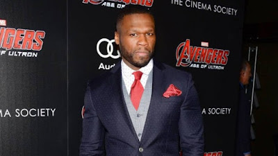 Cantor 50 cent agride mulher durante show
