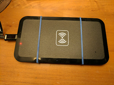 Wrap Rubber Bands Around Each End to Reduce Slipperiness You can wrap a rubber band around each end of the pad to keep it, and your phone, from slipping around.