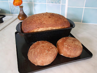 Bread standing for 5 minutes before being removed from tin.