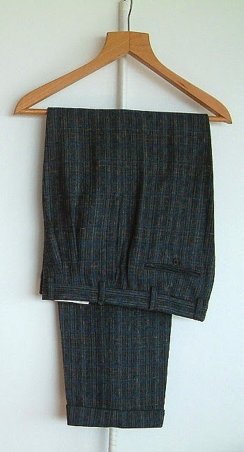 1980s fleck trousers with twin pleats, tapered legs and turn-ups