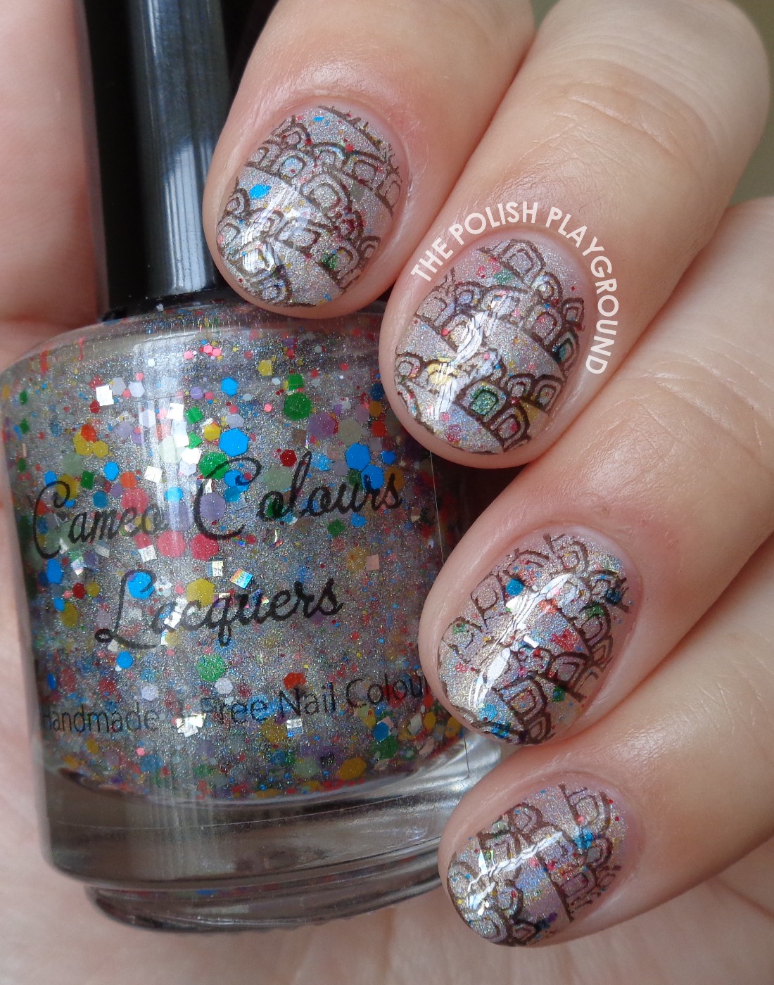 Holographic and Glittery Base with Black Pattern Stamping Nai Art