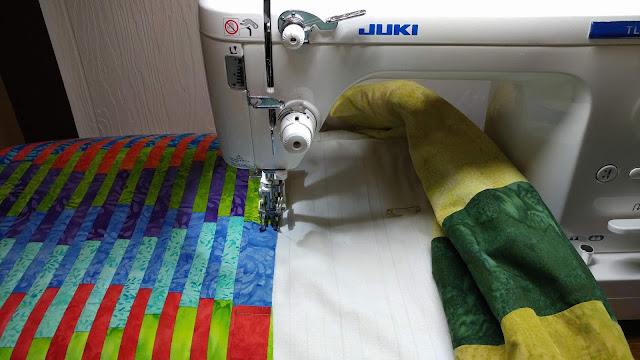 Modern batiks quilt as you go interleave quilt