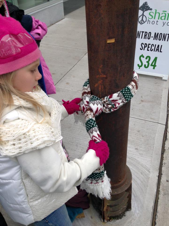 Canadian Children Wrap Street Poles With Coats So That