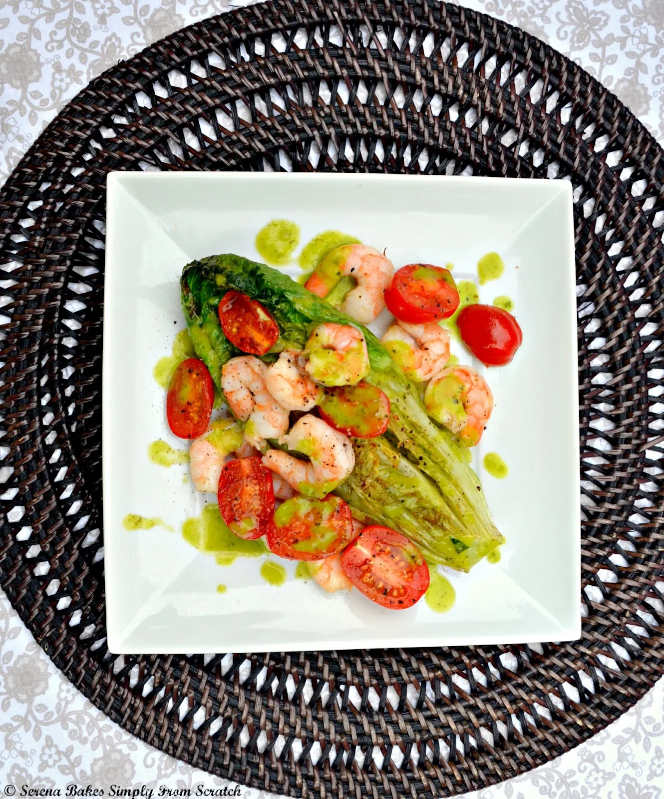 Grilled Romaine Salad with shrimp and a basil vinaigrette made with romaine hearts is a delicious main dish or side warm salad recipe from Serena Bakes Simply From Scratch.