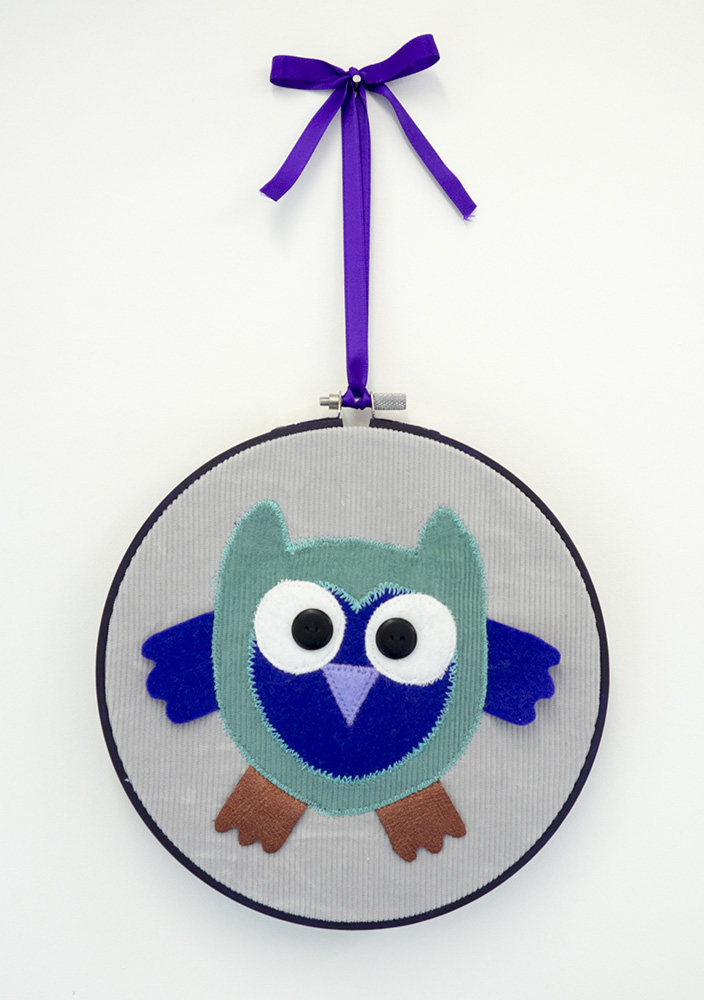 We laugh indoors owls in embroidery hoops We laugh indoors owls in embroidery hoops