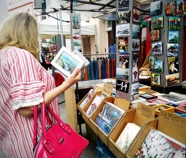 Exploring Galway city - colours and unexpected art by Annie Japaud shopping for art at the market