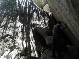 The group starting their descent down the rocky path from the temple