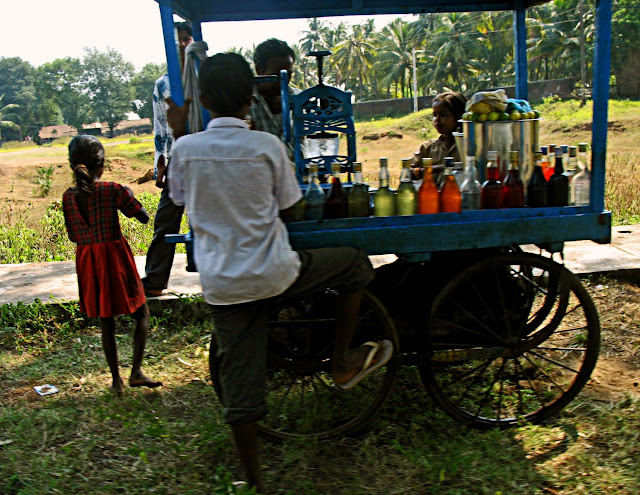 children consuming coloured synthetic drinks in India