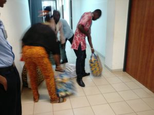 Recall process: INEC officials drop notice, Ghana-must-go bags outside Senator Dino Melaye?s office