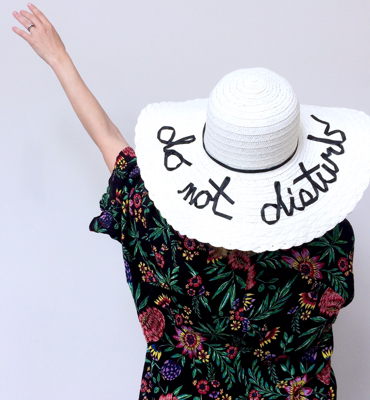 floppy hat with writing