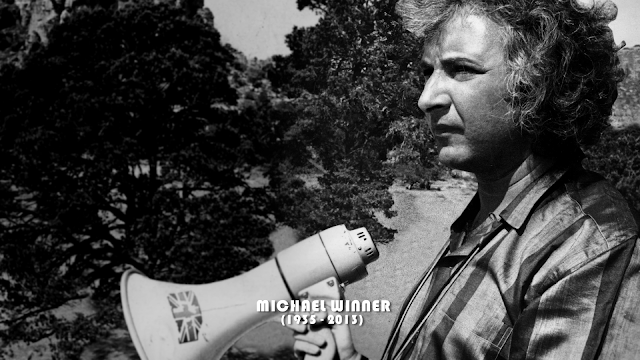 director michael winner, holding a megaphone, probably to yell at someone for not doing it better 