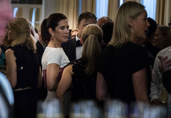 Crown princess Mary wore David Andersen dress and she wore Sergio Rossi Zani pumps and carried Carlend Copenhagen clutch at fashion dinner