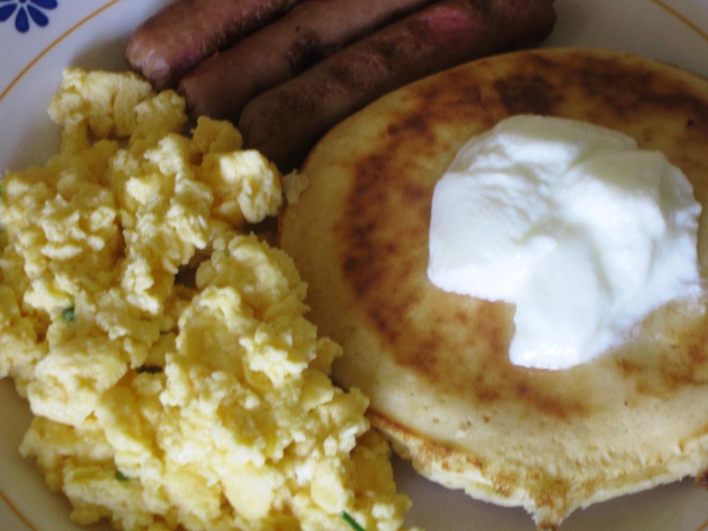 At Our Kitchen Pancakes with Scramble Eggs and Sausage