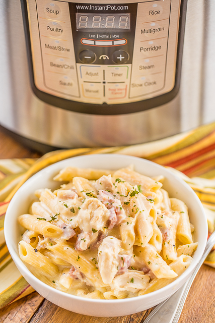 Instant Pot Chicken Cordon Bleu Pasta - only 4 minutes of cook time! Chicken, ham, dijon mustard, garlic, cream cheese, penne pasta, chicken broth, water, swiss cheese and parmesan. Crazy delicious! We made this twice in one week. #instantpot #chicken #pasta #ham #cheese Instant Pot Chicken Cordon Bleu Pasta - only 4 minutes of cook time! Chicken, ham, dijon mustard, garlic, cream cheese, penne pasta, chicken broth, water, swiss cheese and parmesan. Crazy delicious! We made this twice in one week. #instantpot #chicken #pasta #ham #cheese