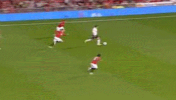 Phil+Jones+epic+slide+tackle+on+Bale.gif