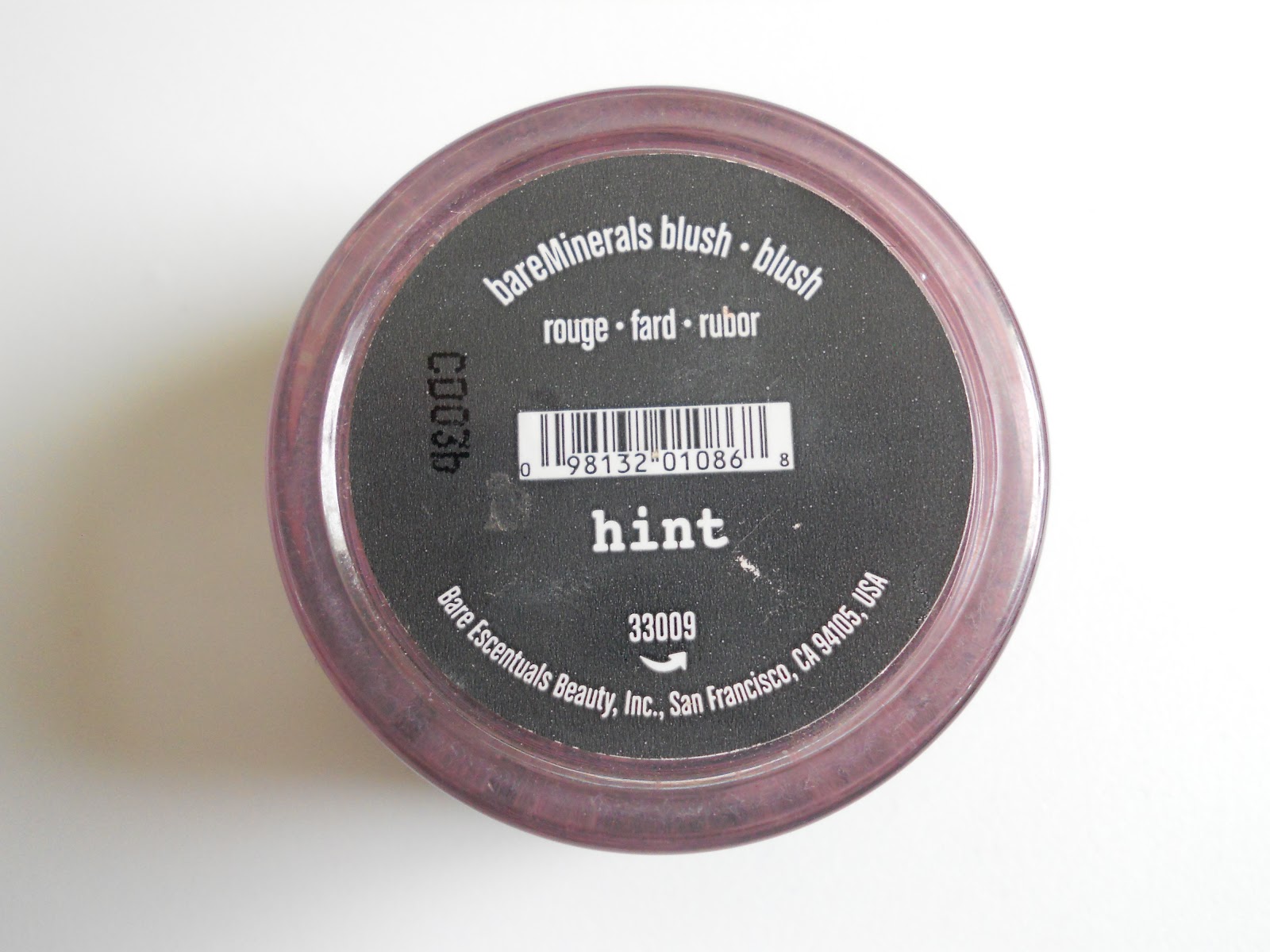 The Powder Room Cheek Chic Bare Minerals blush in "Hint"