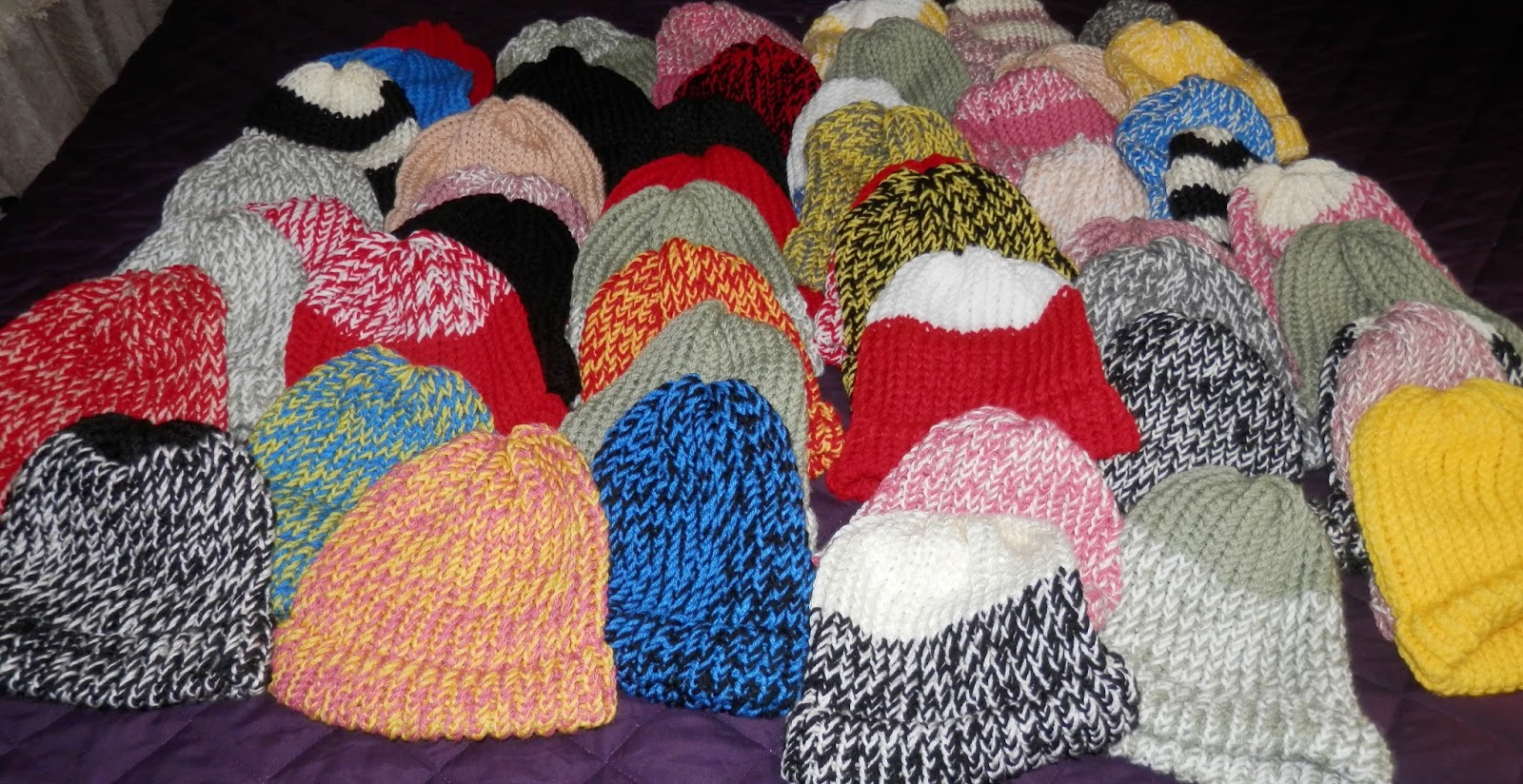 Karens Crocheted Garden of Colors 50 Loom Knitted Hats and Donation to