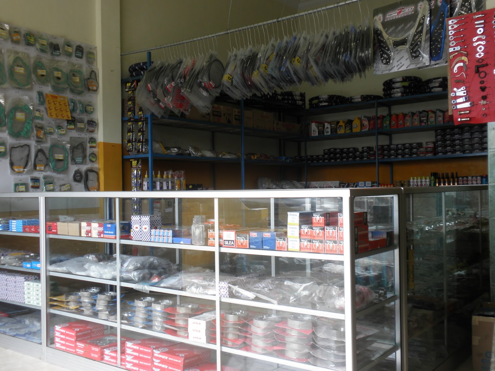 RAJA MURAH MOTOR USAHA BENGKEL MOTOR DAN TOKO SPARE PART