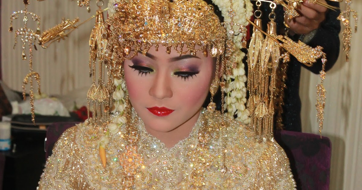 pakaian adat pengantin betawi 