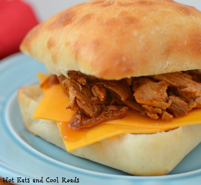 A sweet and tangy recipe that's perfect for lunch, dinner or even potlucks! So simple and tasty! Slow Cooker Brown Sugar Balsamic Shredded Pork Sandwiches Recipe from Hot Eats and Cool Reads