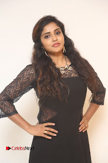 Actress Karunya Stills in Black Long Dress at Dharma Yogi Audio Launch  0013