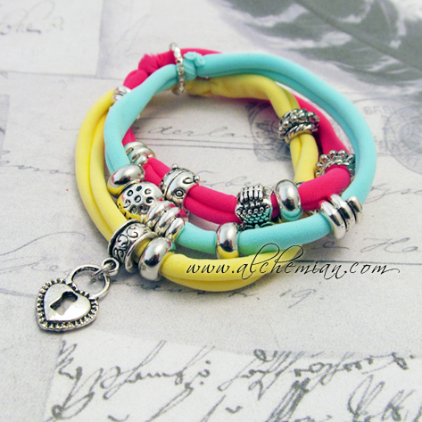 Risultati immagini per alchemian lycra fettuccia bracciale