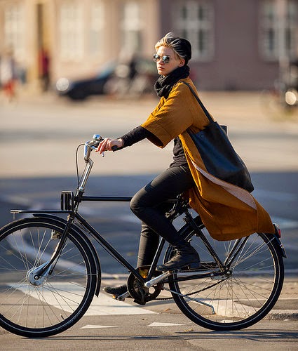 Elegant Danish Woman Fashionably Dressed on her Bike
