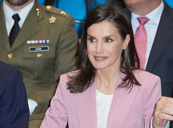 Queen Letizia wore Hugo Boss Jericoa stretch wool double breasted blazer and trousers an Boss silk blouse