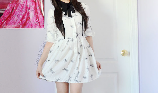SheIn Fashion Review: Shirtdress, Floral Romper + Ripped Black Jeans Details on the white long sleeve fold-collar buttoned dragonfly print shirtdress from SheIn, featuring contrast piping, convertible sleeves, a detached neck tie, and a pleated skirt.