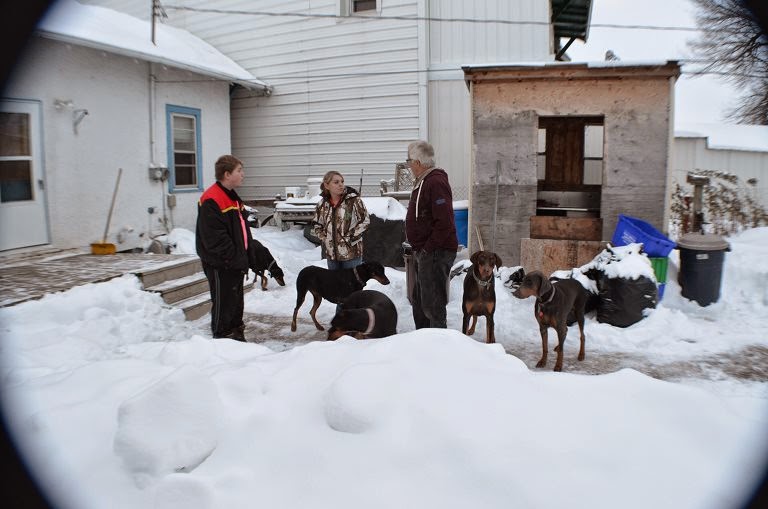 2 puppies visit Grandpa (Photo by Trisha Field)