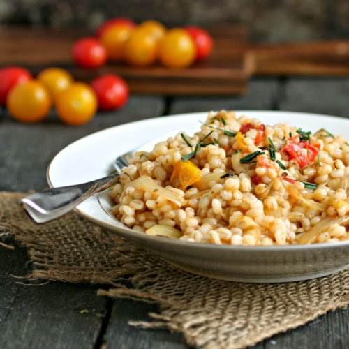 Recipe for fragrant, nutty barley as a wonderful side dish paired with sauteed onion and tomatoes.