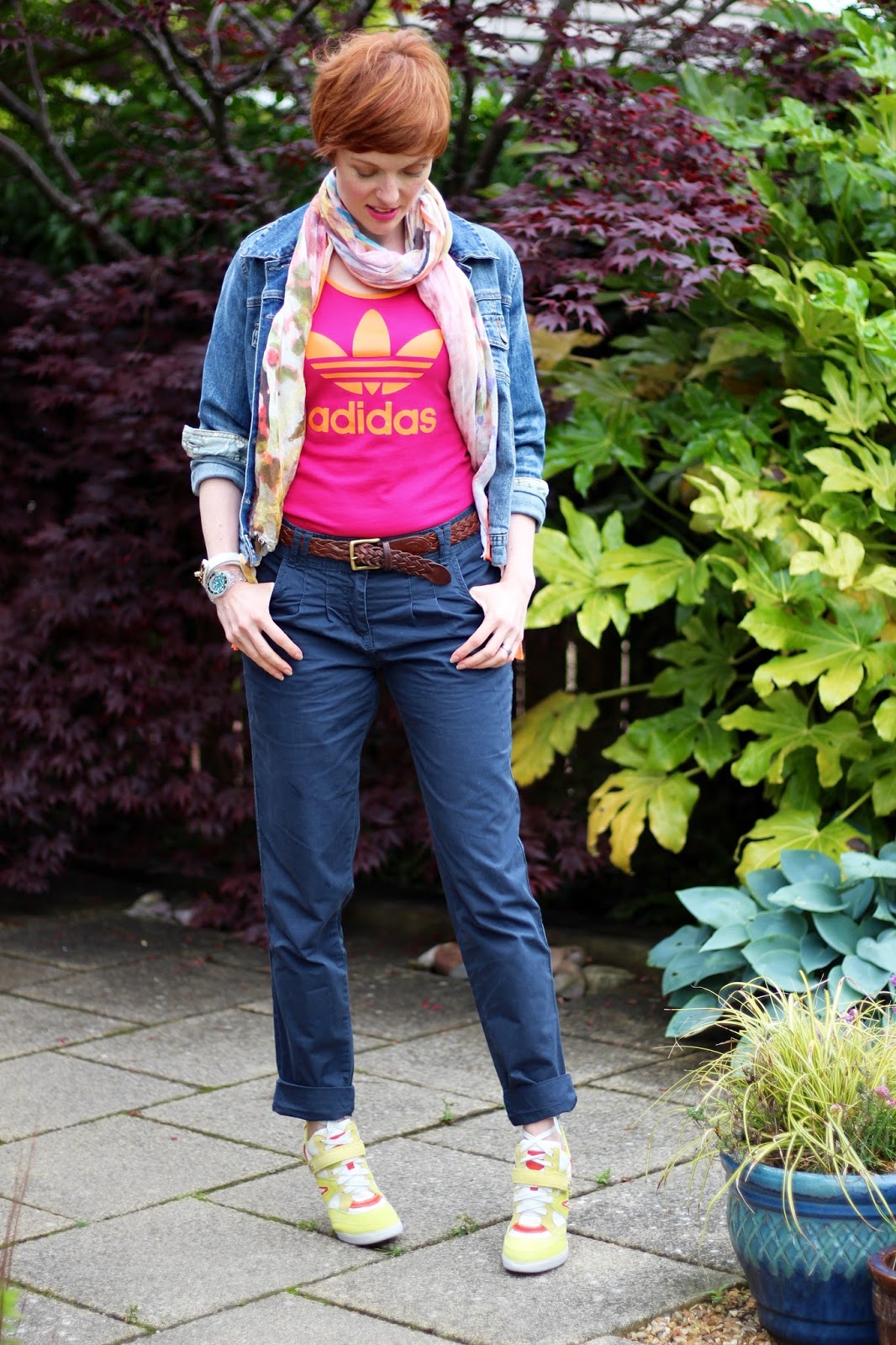 Fake Fabulous | Sports chic. Adidas vest top, Denim Jacket, navy chinos, stiletto trainers, pink and orange 