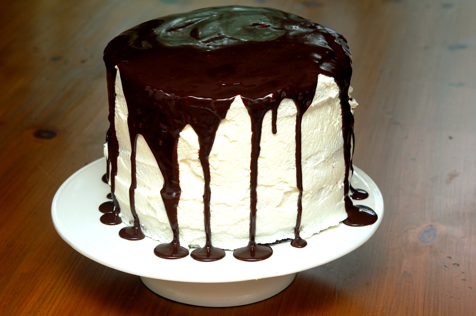 TRIPLE LAYER CHOCOLATE CAKE FILLED WITH OREO TRUFFLES & PEANUT BUTTER