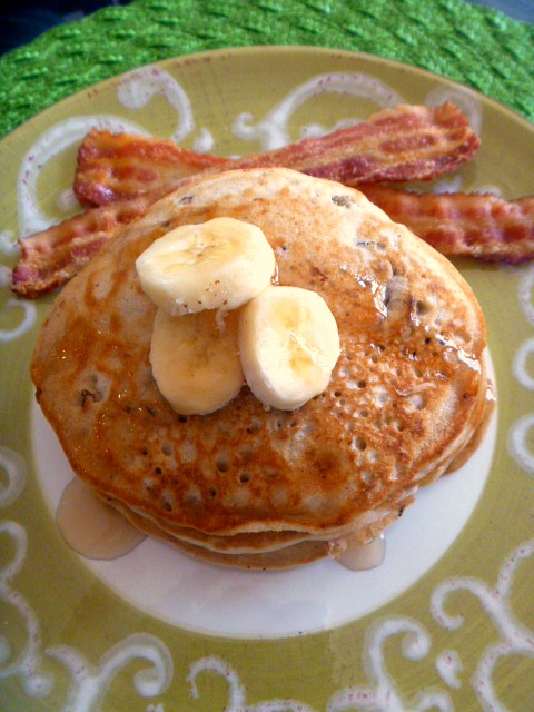 Banana Walnut Pancakes: Light fluffy steaming hot pancakes laced with bananas and walnuts are doused in warm maple syrup. - Slice of Southern