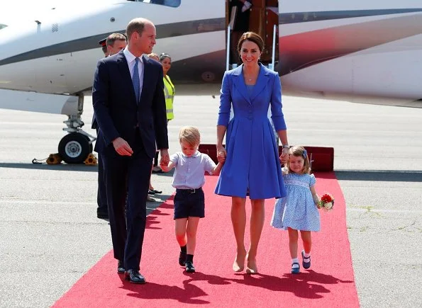 Angela Merkel. Kate Middleton wore a blue dress by Catherine Walker, Kiki McDonough Diamond Earrings, Gianvito Rossi Suede Pumps