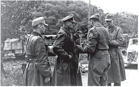 The moment at which General Otto Fretter-Pico (second left) formally surrendered to Brazilian forces in Fornovo di Taro