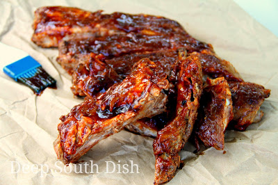 Grilled spareribs or baby back ribs, get a boost first in the oven and then take a final sear on the grill