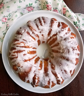 This cake is a must make. It is an Easter tradition for many Polish families. It is a no knead enriched yeast bread that soaks up a river of syrupy lemon goodness. The final result is soft and flavorful, perfect with a cup of coffee at Easter brunch. So go ahead and pour yourself a mug of steaming coffee and grab a slice, let's sit down and enjoy it together. finished babka ring