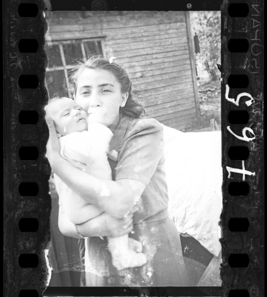 These 32 Pictures Had Been Buried For Years. The Reason Is Heart-Breaking - 1940-1942: Woman With Her Child (Ghetto Policemen's Family)