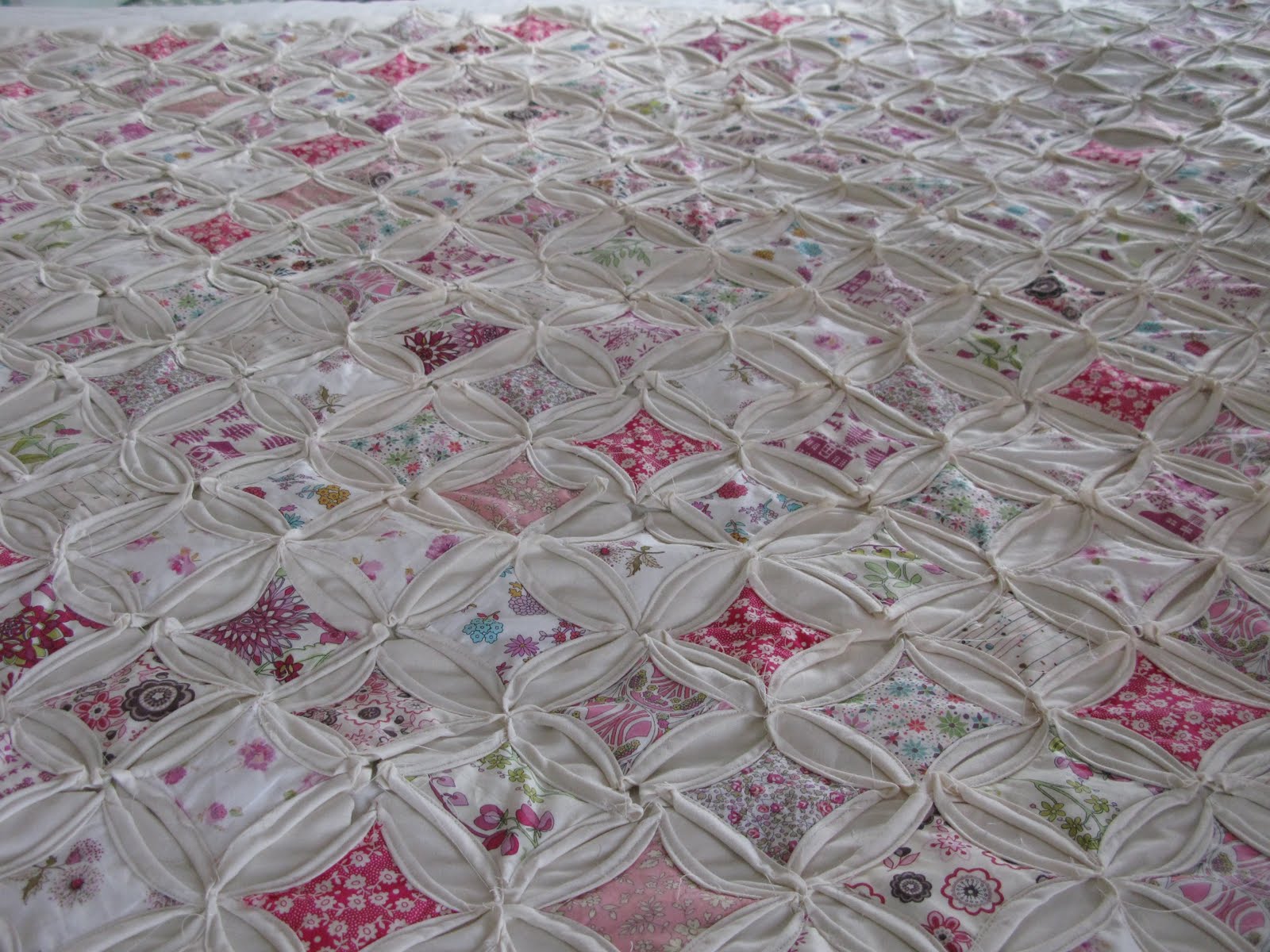 Sew Nancy cathedral window quilt