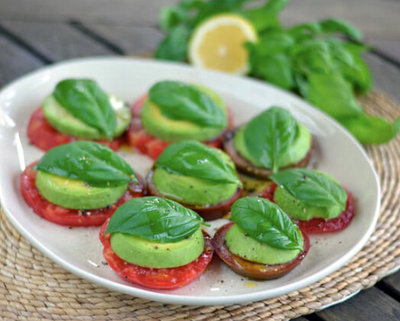 Heirloom Tomato Avocado Caprese Salad @ CookEatPaleo.com, another Pretty Way to Serve Tomatoes @ AVeggieVenture.com.