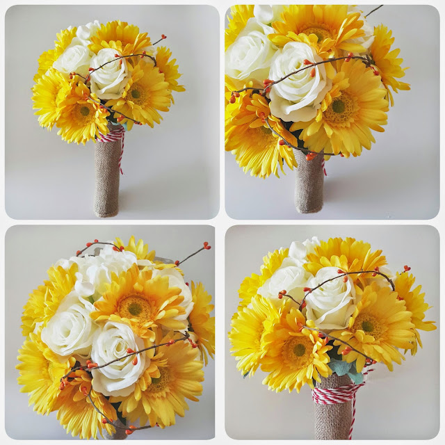 the rustic bouquet of yellow gerber daisy and white roses wrapped with burlap