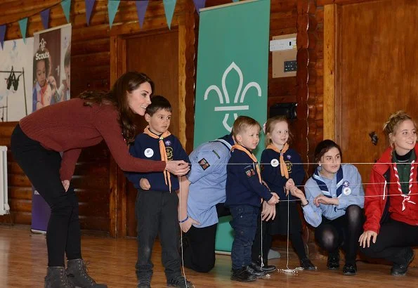 Kate Middleton is wearing her J Crew Mockneck sweater and Chloe boots