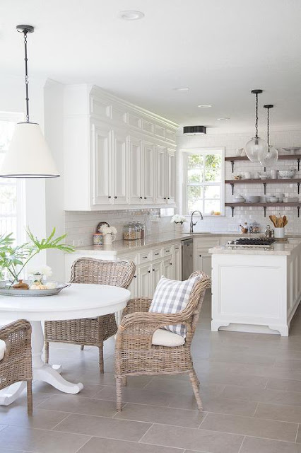 eat in kitchen black and white pendant round dining table wicker chairs