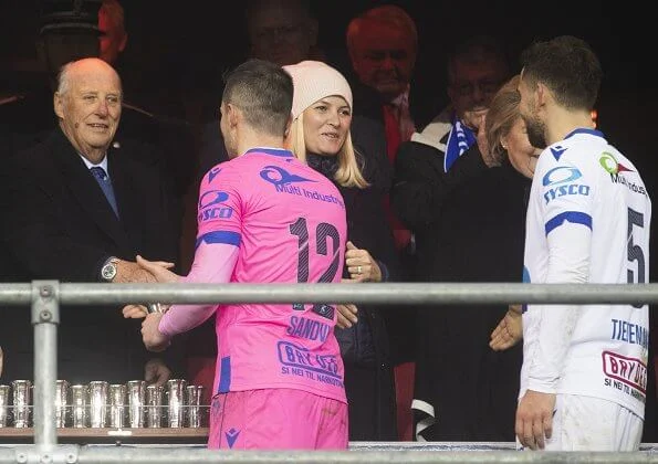 King Harald, Crown Princess Mette-Marit and Prime Minister Erna Solberg attend the cup final between Haugesund and Viking